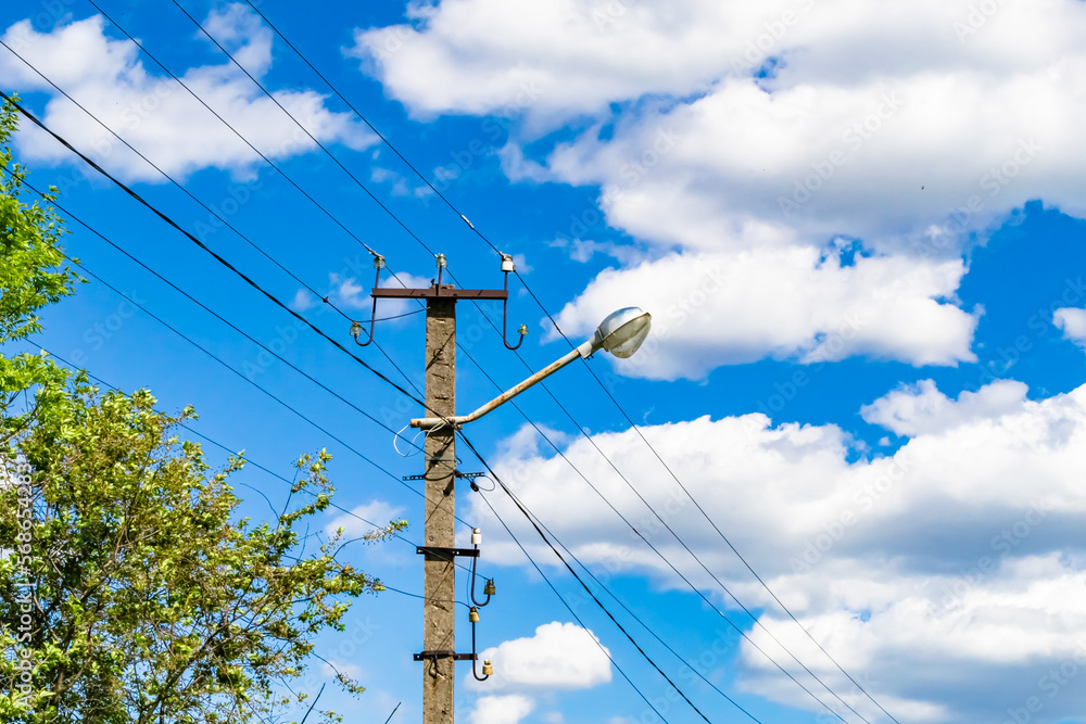 Power electric pole with line wire on colored background close up Power electric pole with line wire on colored background close up