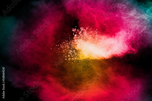Red yellow and green particles textured background. Vibrant color dust particles textured background. © Pattadis