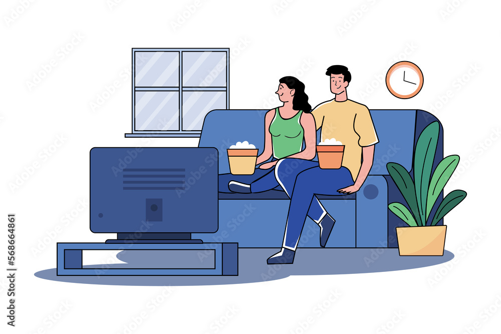 A couple watching tv in the living room
