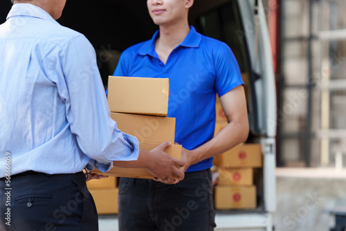 Asian Man hand accepting a delivery boxes. delivery logistic concept