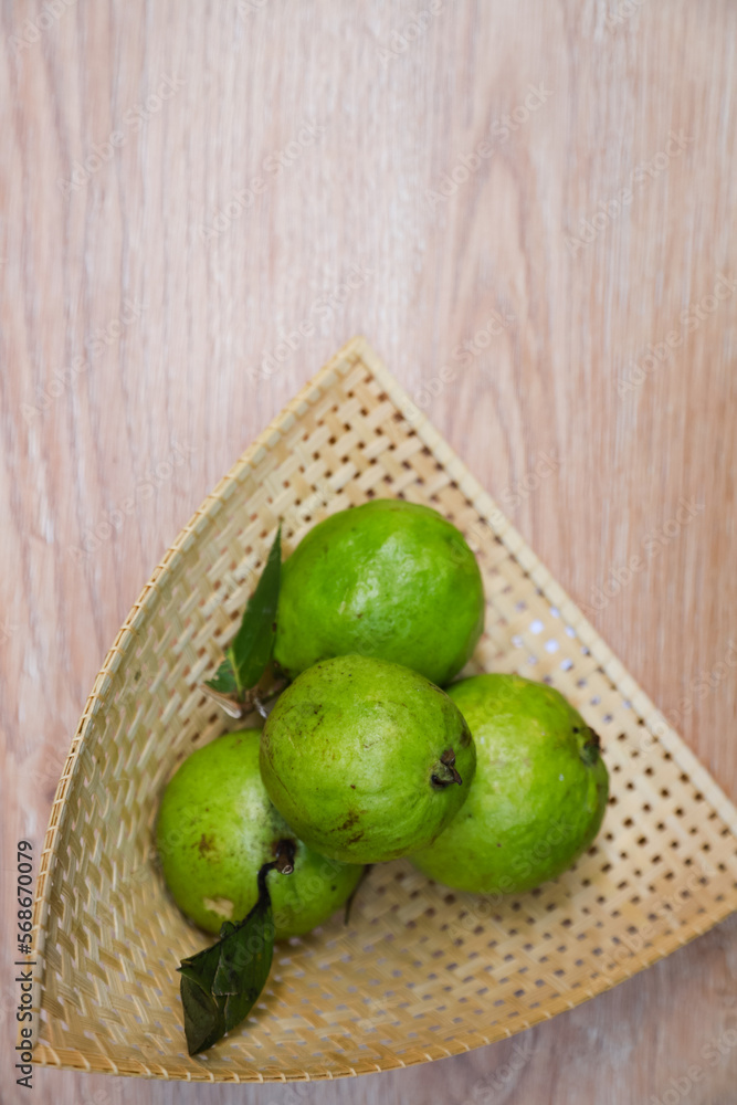 Some fresh guava on bamboo tray