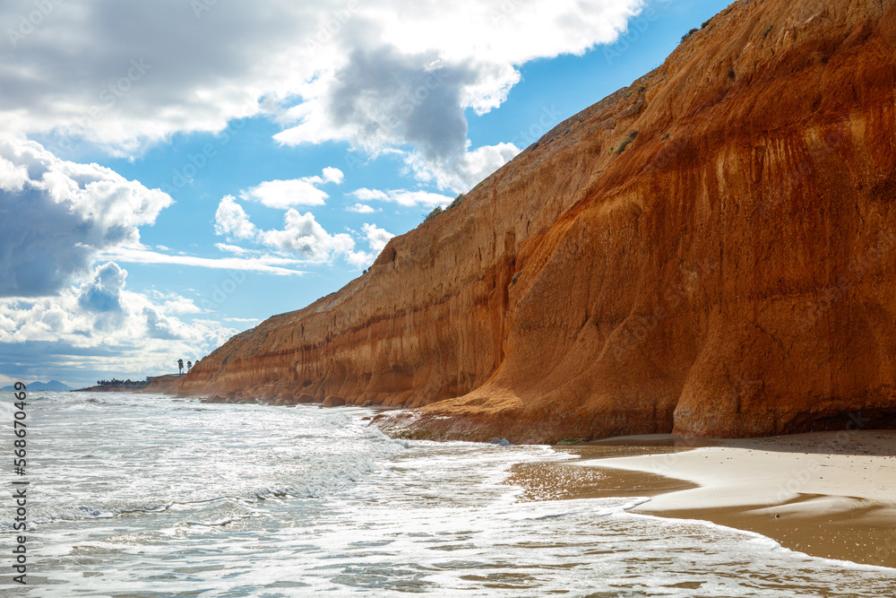 Coast sea mediterranean, beach and cliff, Campoamor, Alicante province in Spain Coast sea mediterranean, beach and cliff, Campoamor, Alicante province in Spain