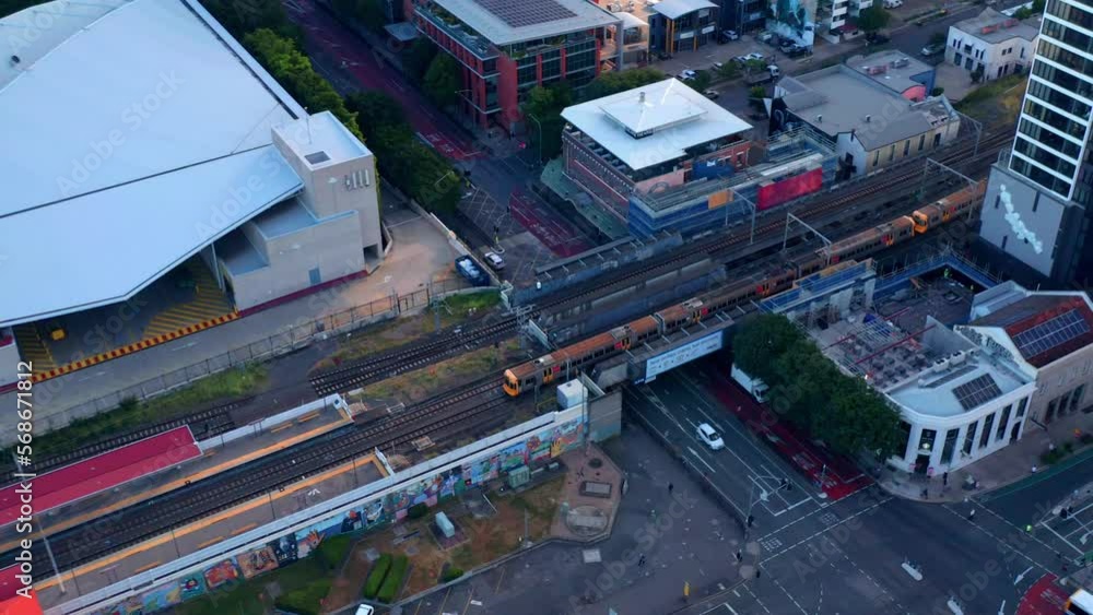 Aerial view of Train Arriving At The South Brisbane Station near South Bank, Brisbane City, Queensland, Australia Aerial view of Train Arriving At The South Brisbane Station near South Bank, Brisbane City, Queensland, Australia