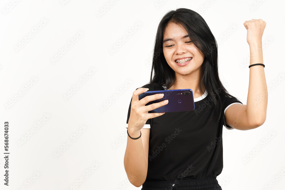 Smiling and Playing Mobile Game on Smartphone Of Beautiful Asian Woman Isolated On White Background Smiling and Playing Mobile Game on Smartphone Of Beautiful Asian Woman Isolated On White Background