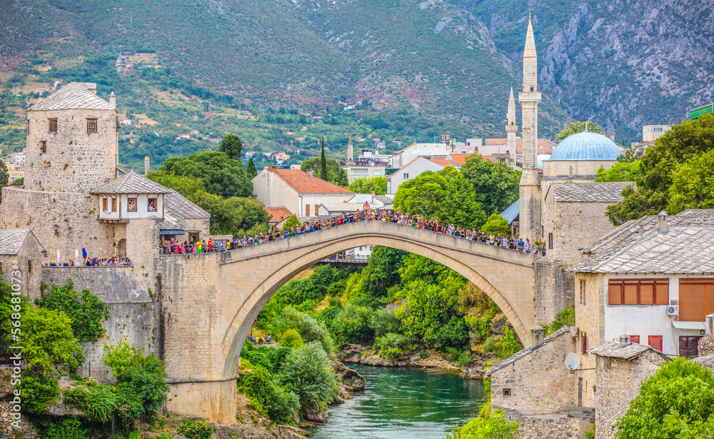 Panorama of Historical Stari Most bridge over Neretva river in Mostar Old town, Balkan mountains, Bosnia and Herzegovina