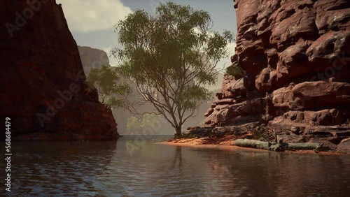 Reflection in Colorado River of Butte catching days last rays, in Grand Canyon. photo