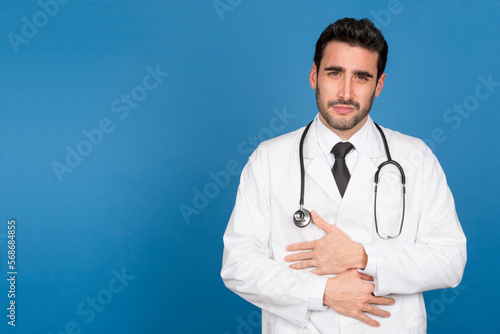 Doctor gesturing stomach pain touching his belly