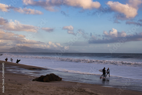 Surfers wiping out on giant waves in Santa Barbara California