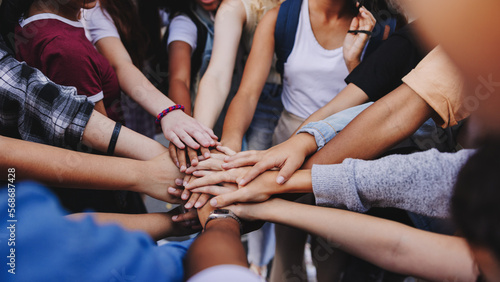 Slika na platnu Multicultural teenagers expressing their unity and teamwork