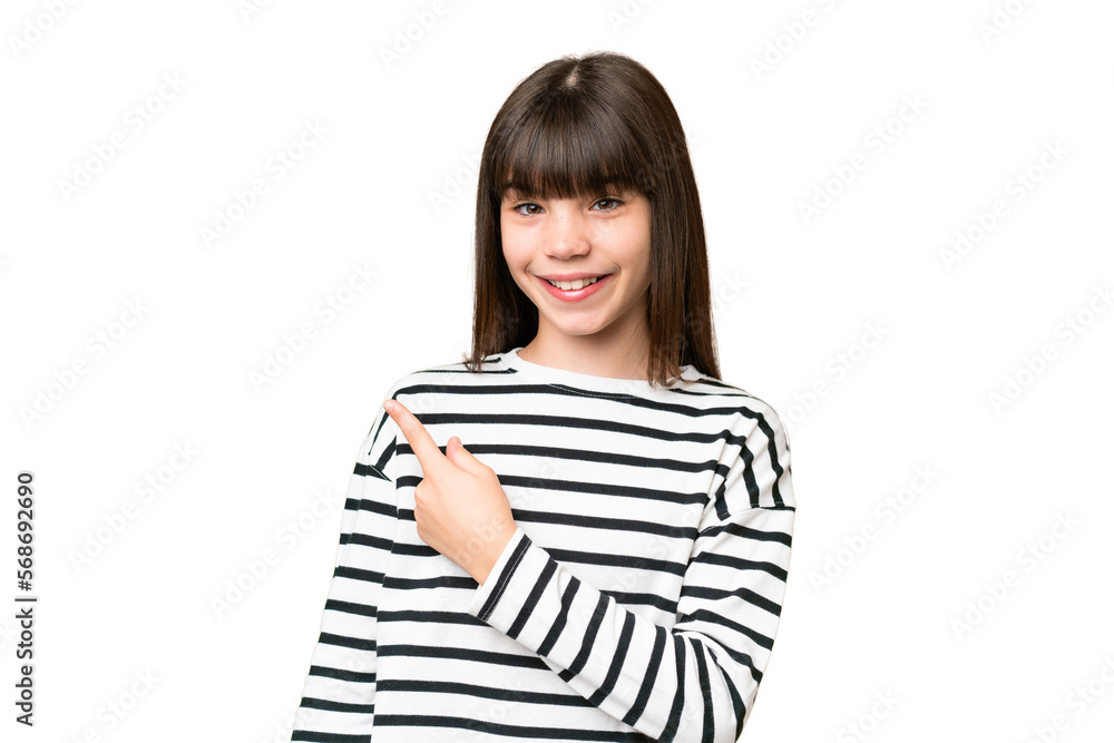 Little caucasian girl over isolated background pointing to the side to present a product Little caucasian girl over isolated background pointing to the side to present a product