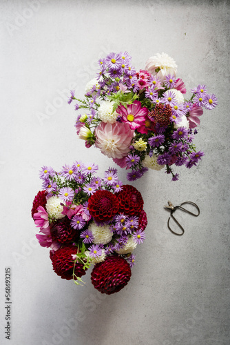 Studio shot of two bouquets of seasonal flowers photo