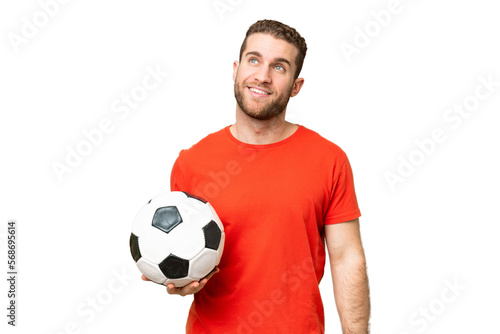Handsome young football player man over isolated chroma key background thinking an idea while looking up