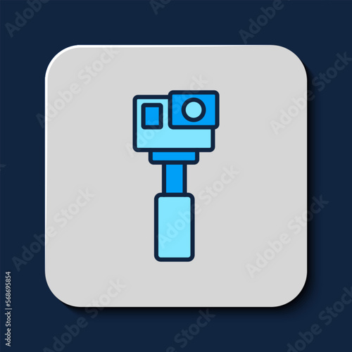 Filled outline Action extreme camera icon isolated on blue background. Video camera equipment for filming extreme sports. Vector