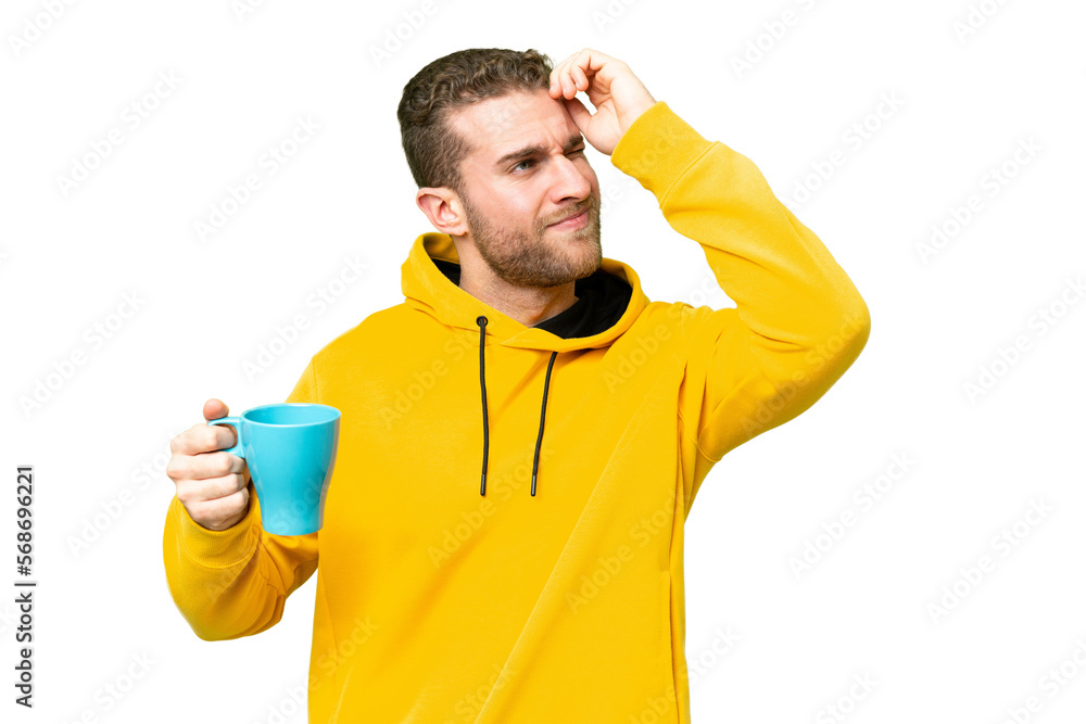Young handsome blonde man holding cup of coffee over isolated background having doubts and with confuse face expression Young handsome blonde man holding cup of coffee over isolated background having doubts and with confuse face expression