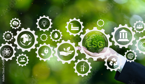 ESG icon concept in hand for environmental, social and governance in sustainable and ethical business