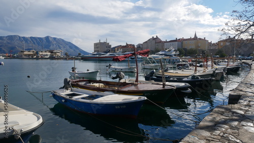 Boats at the pier. Small boat on the seashore. Recreation boat. Boat for a sea trip. fishing boat
