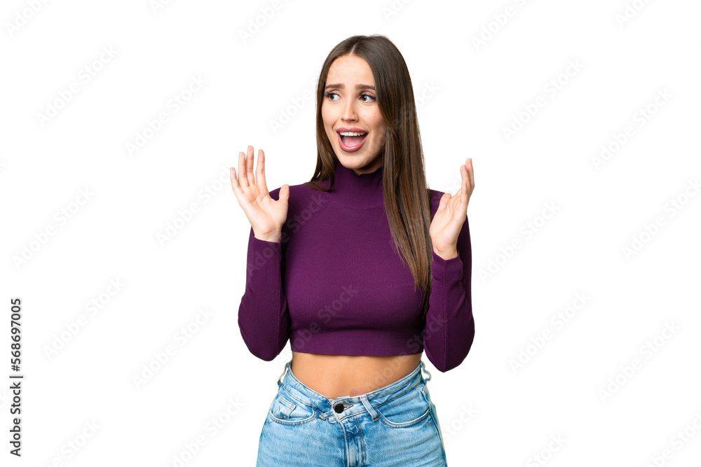 Young beautiful woman over isolated chroma key background with surprise facial expression Young beautiful woman over isolated chroma key background with surprise facial expression