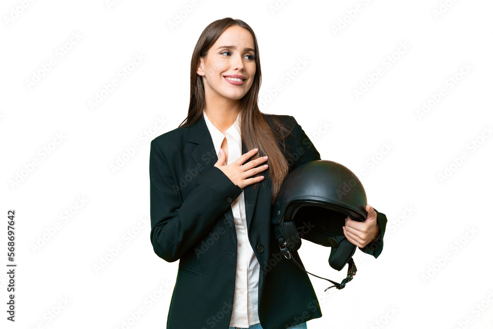 Young Asian woman with a motorcycle helmet over isolated chroma key background looking up while smiling Young Asian woman with a motorcycle helmet over isolated chroma key background looking up while smiling