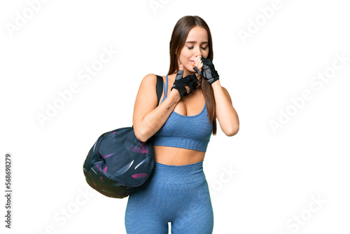 Young sport woman with sport bag over isolated chroma key background is suffering with cough and feeling bad