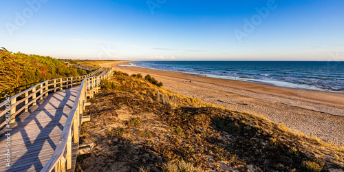 France, Nouvelle-Aquitaine, Le Bois-Plage-en-Re, Panoramic view of empty beachside boardwalk