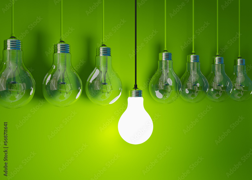 Hanging on cords light bulbs on a green background. Evolution from incandescent to LED lamps. Illustration in 3D. Hanging on cords light bulbs on a green background. Evolution from incandescent to LED lamps. Illustration in 3D.