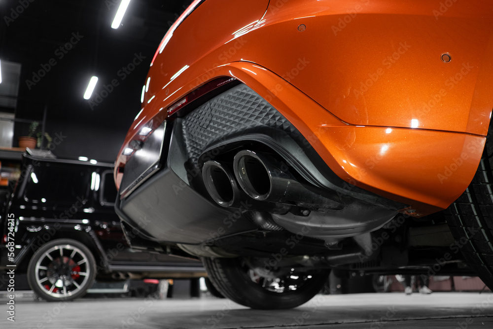 Modern and luxury sports car exhaust system pipes Stock Photo Adobe Stock