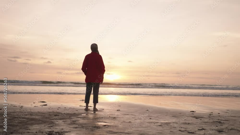 Modern Muslim Woman on Hijab Southeast Asian - Portrait, Smiling, looking to The Sunset. Beautiful Optimistic Hopefull Attractive Close Up Modern Muslim Woman on Hijab Southeast Asian - Portrait, Smiling, looking to The Sunset. Beautiful Optimistic Hopefull Attractive Close Up