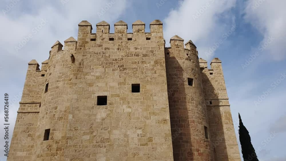 Impressive ancient fortress of Cordoba against a blue summer sky. Torre de calahorra Impressive ancient fortress of Cordoba against a blue summer sky. Torre de calahorra