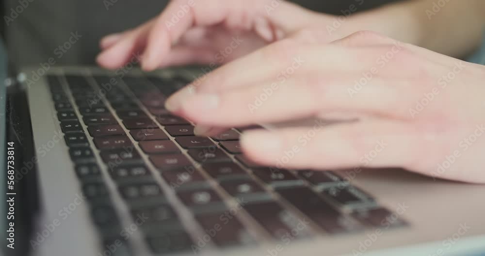 Fingers typing on laptop keyboard. Concept of work at home, women's remote work, freelance, training, chatting. Fingers typing on laptop keyboard. Concept of work at home, women's remote work, freelance, training, chatting.