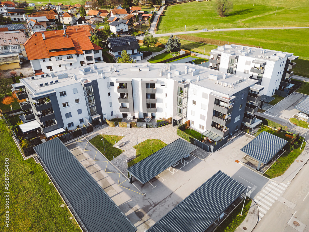 Fototapeta premium White and grey facade on a newly built residential building in the suburbs of Slovenia