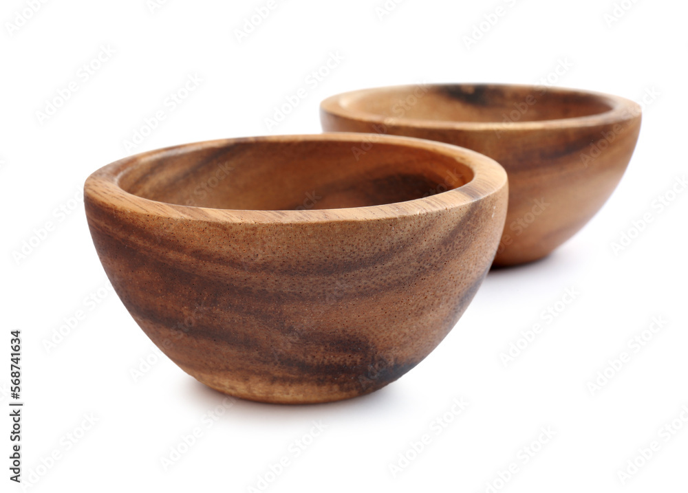 Two new wooden bowls on white background Two new wooden bowls on white background