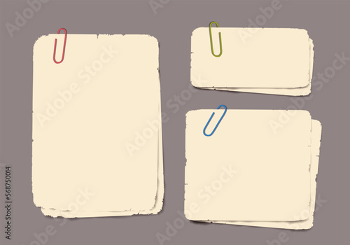 Set of realistic vintage torn papers and paper clips with shadow on transparent background.
