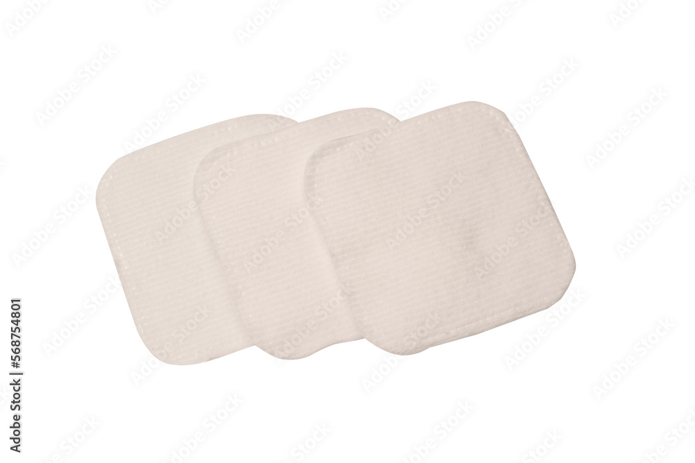 Stack of white cotton sponges isolated on a white background. Stack of white cotton sponges isolated on a white background.
