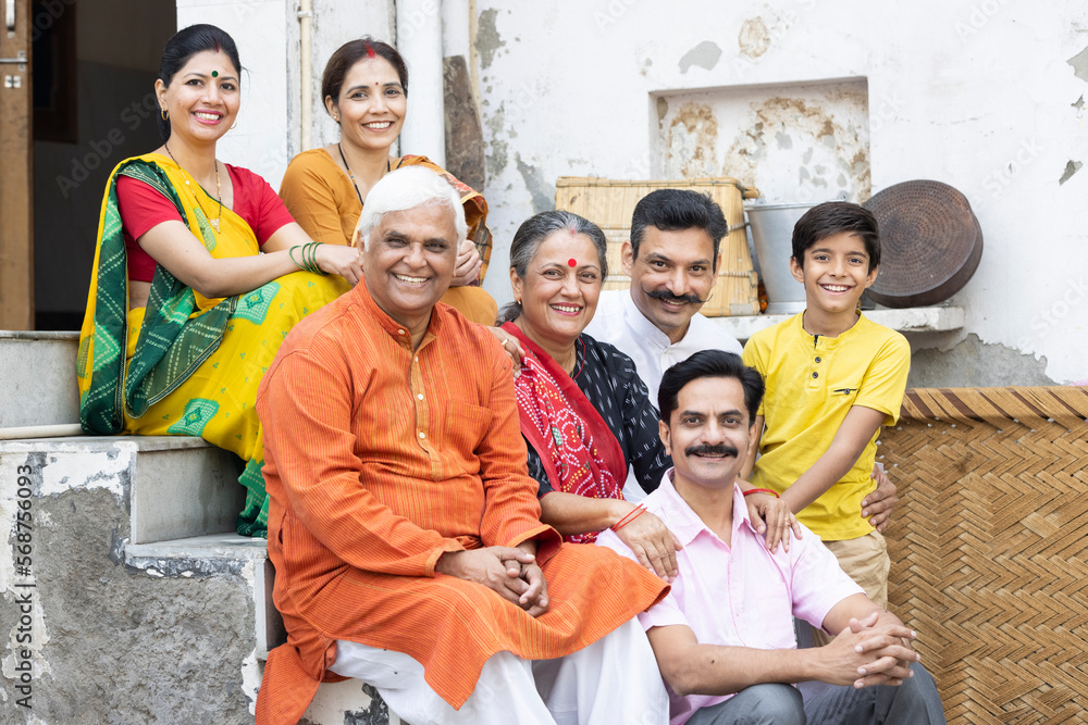 Happy Indian rural family setting at home. Happy Indian rural family setting at home.