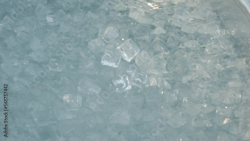 Man preparing ice bath.