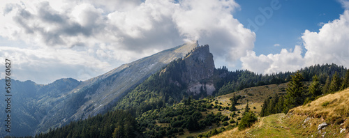 Schafberg and Spinnerin mountain peak, Salzburger land, Upper Austria. Panoramic landscape with clouds over Alps mountains and trekking trail