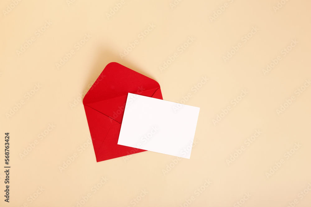Valentine day holiday background with gift, red envelope, paper card, romantic message. Copy space. Top view Valentine day holiday background with gift, red envelope, paper card, romantic message. Copy space. Top view
