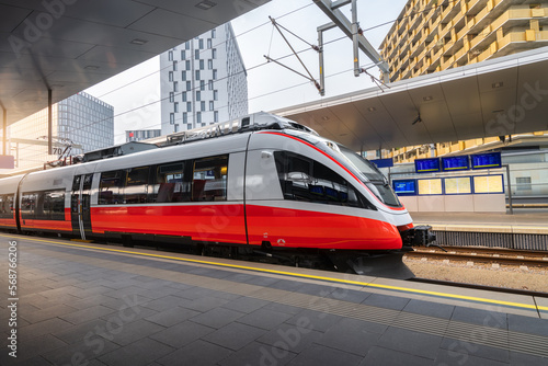 Photography High speed train on the train station at sunset in Vienna, Austria