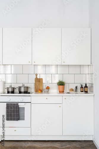 comfort small kitchen with modern appliances and light interior