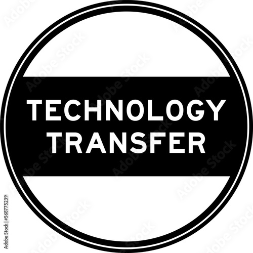 Black color round seal sticker in word technology transfer on white background