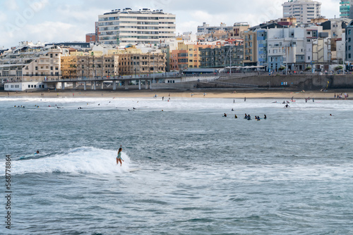 Canvas Print surfing on The Canteras beach in Gran Canaria, Canary islands