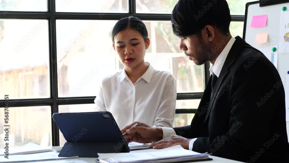 Accounting team manager working with cash flow chart and balance sheet, asset paperwork with stock market monthly statics Accounting team manager working with cash flow chart and balance sheet, asset paperwork with stock market monthly statics