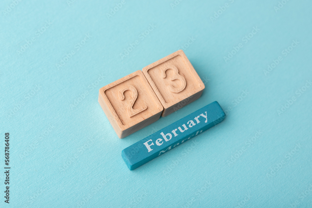 Calendar february date 23 on a blue background Calendar february date 23 on a blue background
