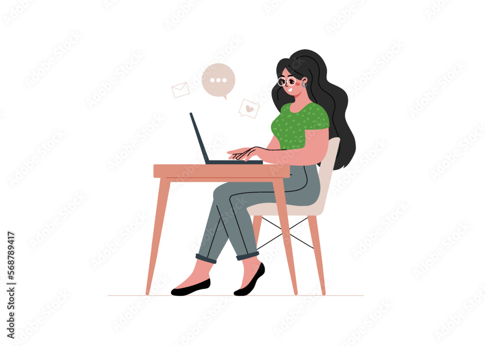 Young woman sits at desk and works,studying or freelancing on laptop from home