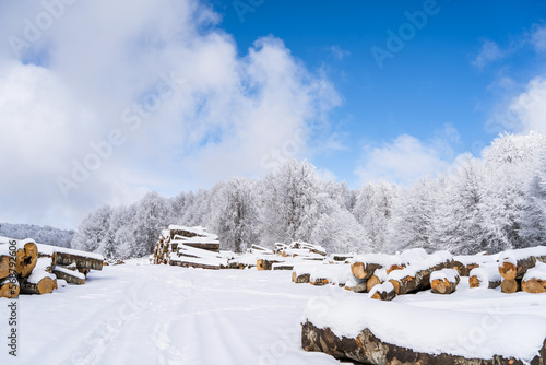 Timber warehouse under the snow