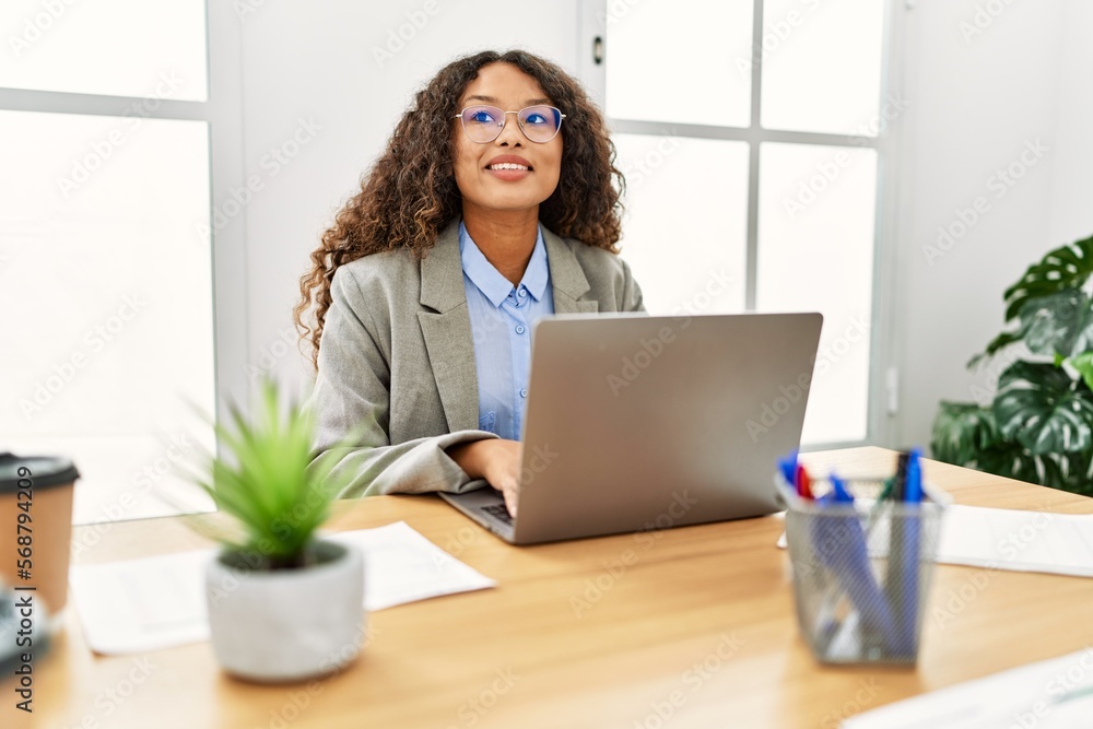 Young latin woman smiling confident working at office Young latin woman smiling confident working at office