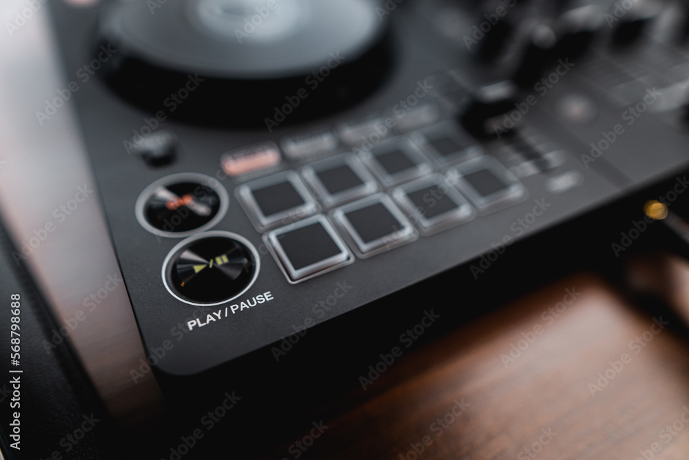 Close-up dj controller and Sound mixing desk at home Close-up dj controller and Sound mixing desk at home
