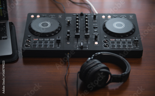 Close-up  dj controller and Sound mixing desk at home