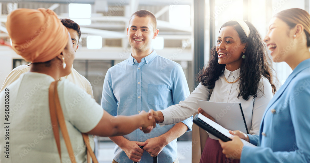 Obraz premium Diversity, team and handshake for partnership, business and collaboration in modern office. Teamwork, multiracial and staff greeting, hand gesture for welcome and group project for startup company.