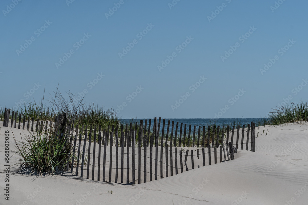 Waves, sand and blue sky on beach in Stone Harbor, New Jersey